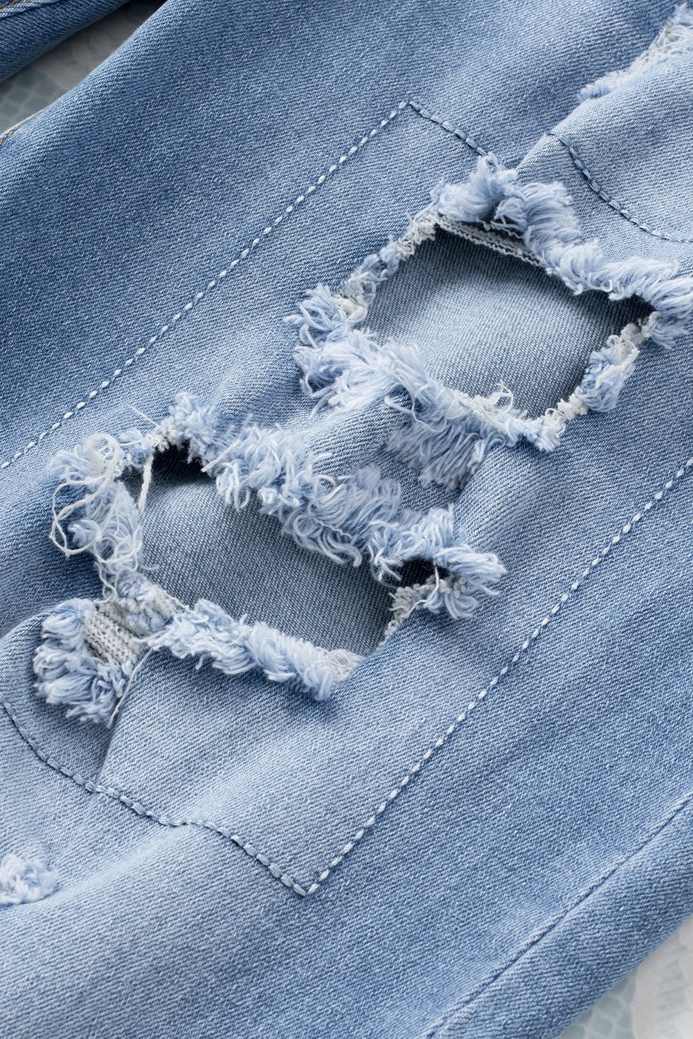 Sky Blue Buttoned Pockets Distressed Jeans - Premium Bottoms from Momma Done Gone Crafty- Just $38.99! Shop now at Momma Done Gone Crafty