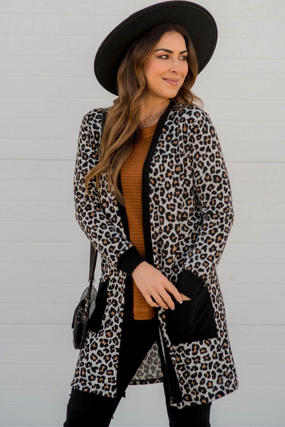 Black Leopard Patched Pocket Open Front Cardigan - Premium Sweaters & Cardigans/Cardigans from Momma Done Gone Crafty- Just $15.75! Shop now at Momma Done Gone Crafty