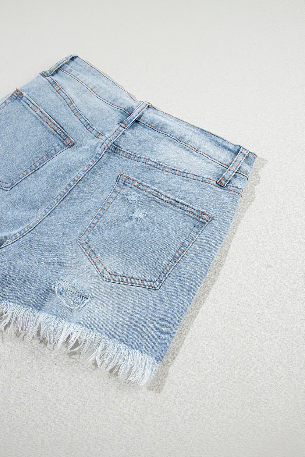 Light Blue Distressed Ripped Raw Hem High Waist Denim Shorts - Premium Bottoms/Denim Shorts from Ashes 2 Wildflowers Boutique, LLC- Just $29.37! Shop now at Ashes 2 Wildflowers Boutique, LLC