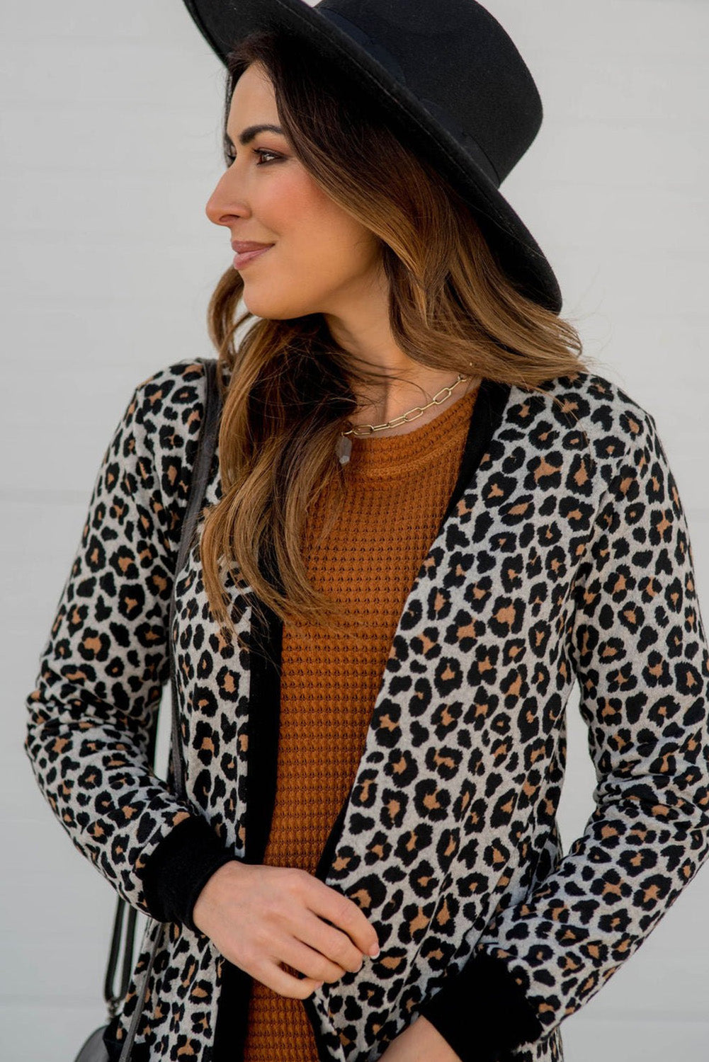 Black Leopard Patched Pocket Open Front Cardigan - Premium Sweaters & Cardigans/Cardigans from Momma Done Gone Crafty- Just $15.75! Shop now at Momma Done Gone Crafty