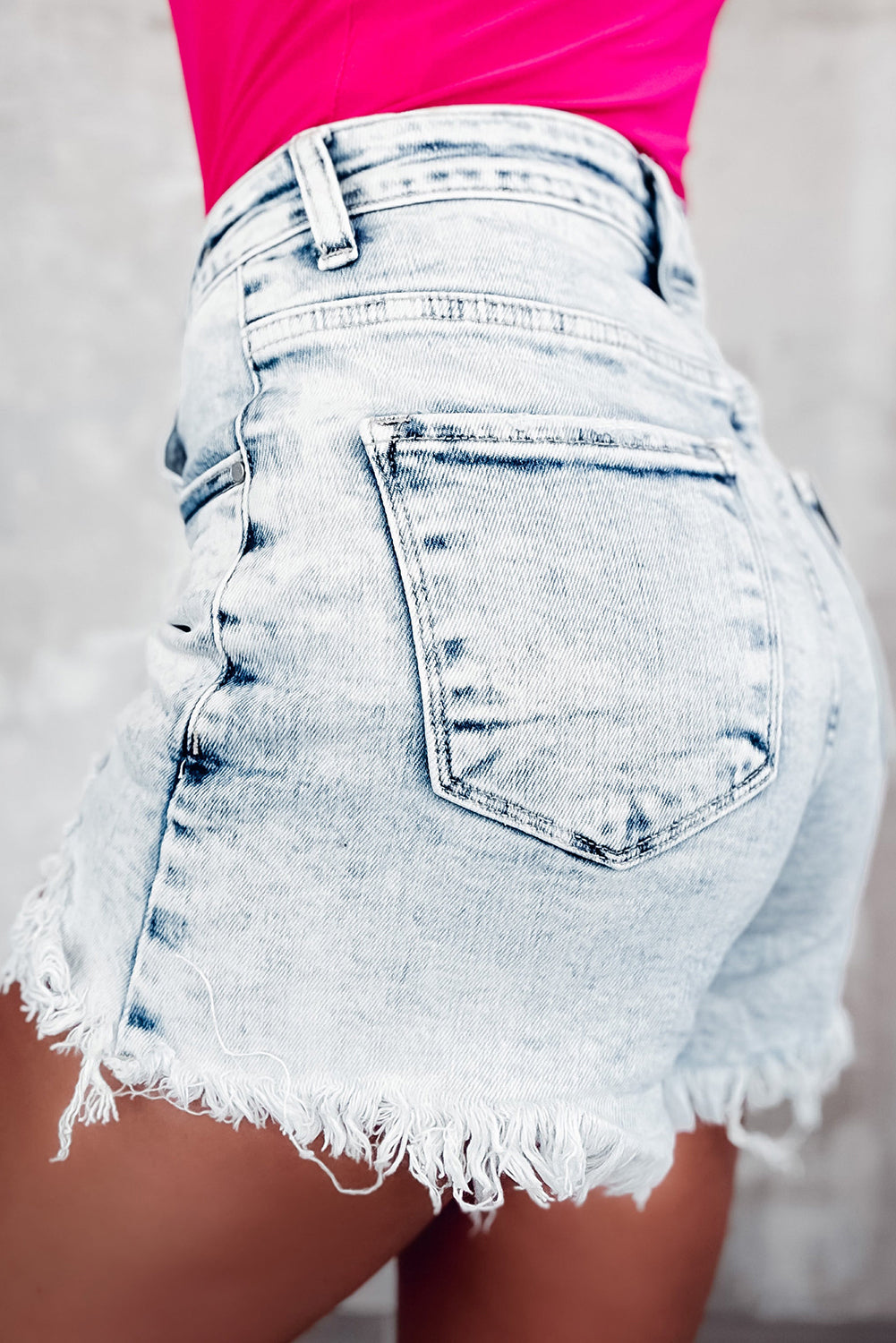 Light Blue Acid Wash Crossed Raw Edge Denim Shorts - Premium Bottoms/Denim Shorts from Ashes 2 Wildflowers Boutique, LLC- Just $29.52! Shop now at Ashes 2 Wildflowers Boutique, LLC