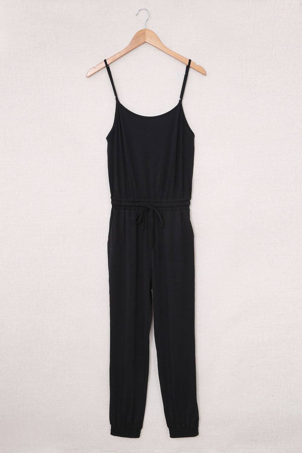 Black Drawstring Waist Spaghetti Straps Jumpsuit - Premium Bottoms from Momma Done Gone Crafty- Just $58.20! Shop now at Momma Done Gone Crafty