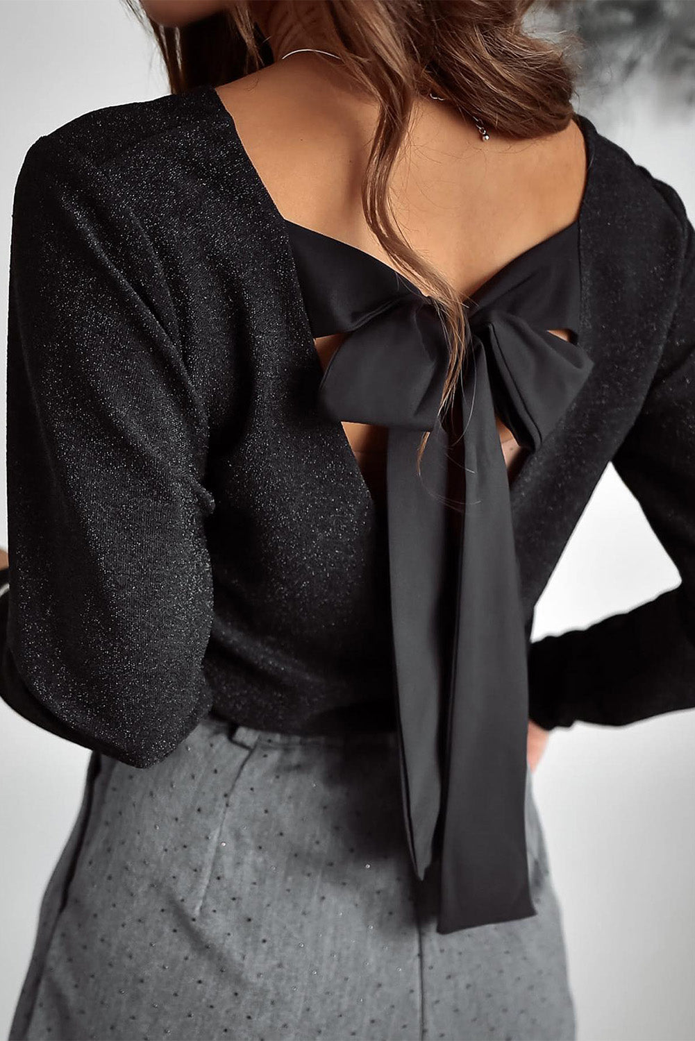 Black Metallic Bowknot Open Back V Neck Top - Premium Tops/Long Sleeve Tops from Ashes 2 Wildflowers Boutique, LLC- Just $31.33! Shop now at Ashes 2 Wildflowers Boutique, LLC