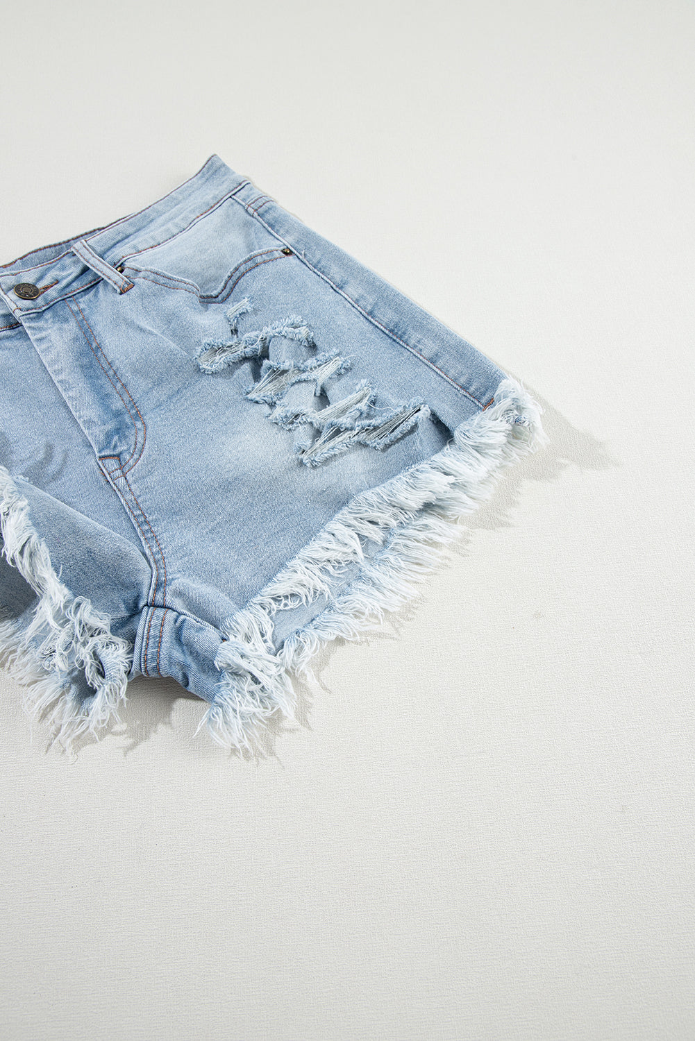 Light Blue Distressed Ripped Raw Hem High Waist Denim Shorts - Premium Bottoms/Denim Shorts from Ashes 2 Wildflowers Boutique, LLC- Just $29.37! Shop now at Ashes 2 Wildflowers Boutique, LLC