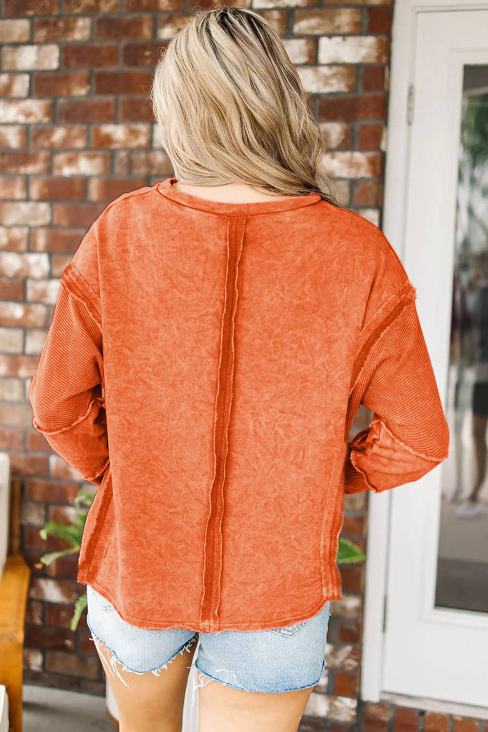 Orange Exposed Seamed High Low Raw Edge Sweatshirt - Premium Tops from Momma Done Gone Crafty- Just $40.80! Shop now at Momma Done Gone Crafty