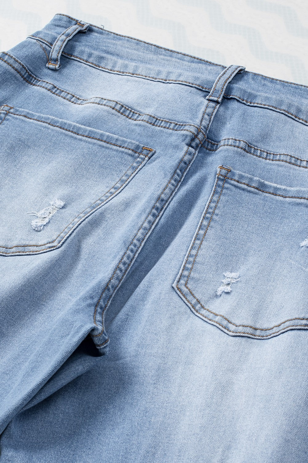 Sky Blue Buttoned Pockets Distressed Jeans - Premium Bottoms from Momma Done Gone Crafty- Just $38.99! Shop now at Momma Done Gone Crafty
