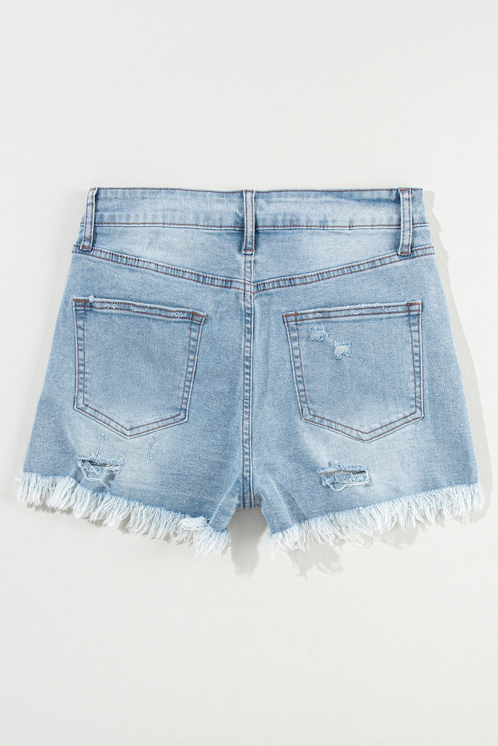 Light Blue Distressed Ripped Raw Hem High Waist Denim Shorts - Premium Bottoms/Denim Shorts from Ashes 2 Wildflowers Boutique, LLC- Just $29.37! Shop now at Ashes 2 Wildflowers Boutique, LLC
