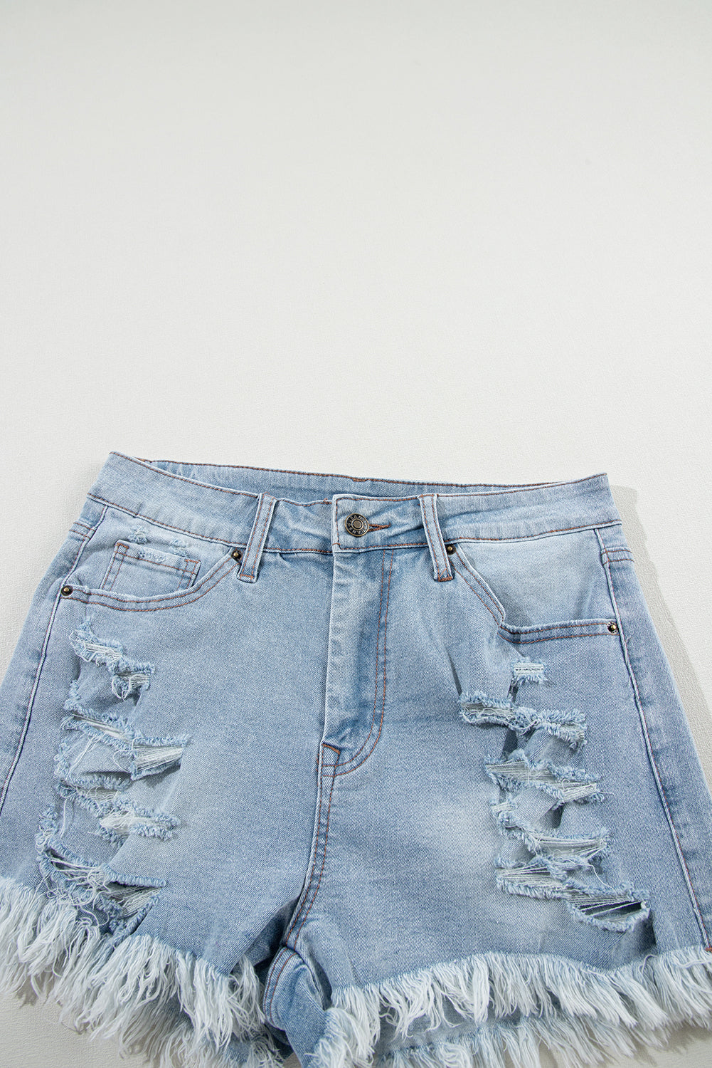 Light Blue Distressed Ripped Raw Hem High Waist Denim Shorts - Premium Bottoms/Denim Shorts from Ashes 2 Wildflowers Boutique, LLC- Just $29.37! Shop now at Ashes 2 Wildflowers Boutique, LLC