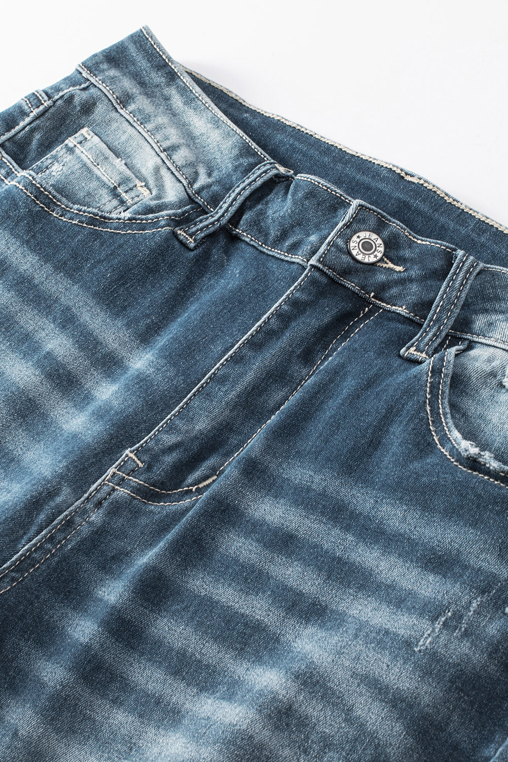 Blue Distressed Ripped Skinny Jeans - Premium Bottoms from Momma Done Gone Crafty- Just $67.20! Shop now at Momma Done Gone Crafty