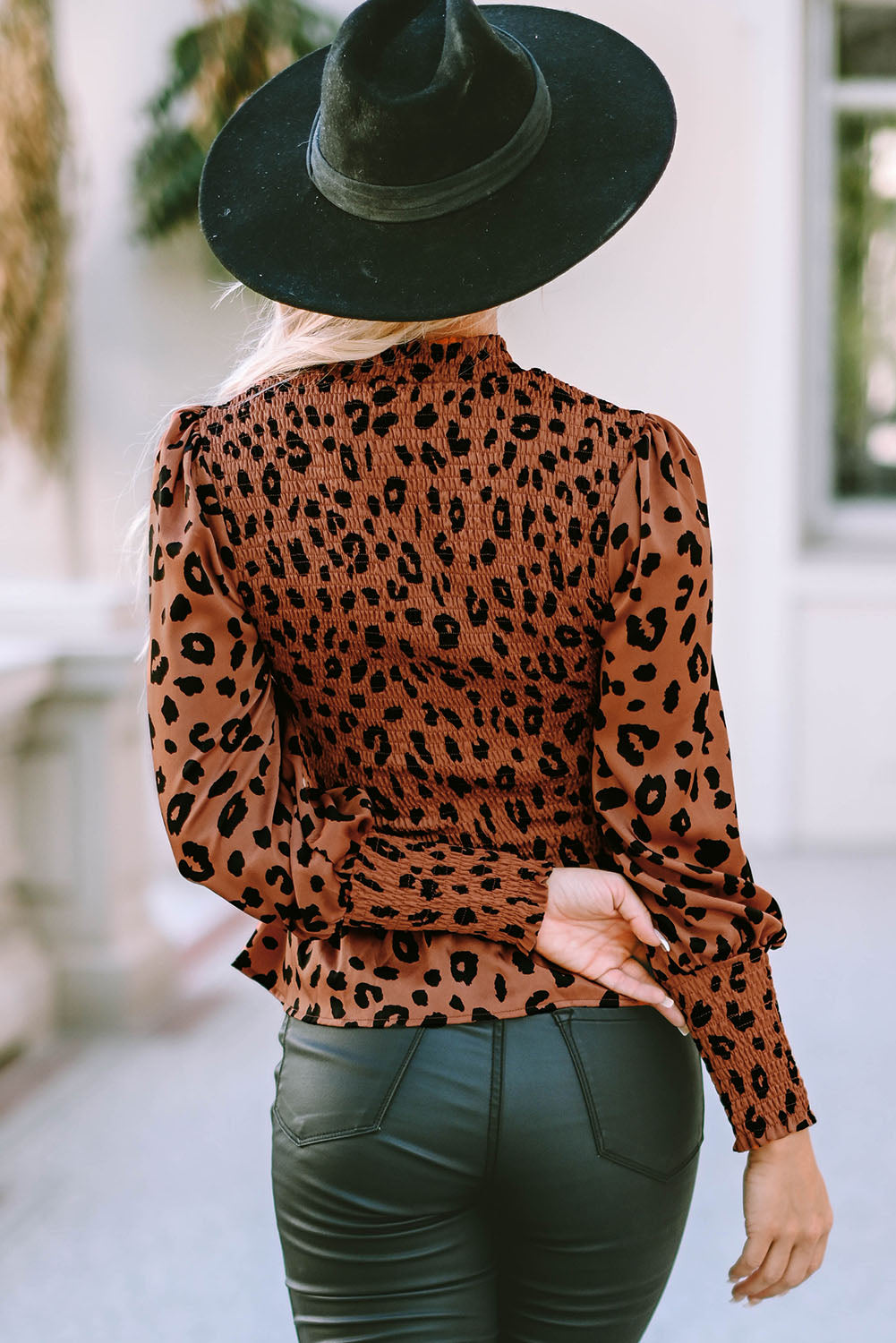 Leopard Smocked Peplum Top - Premium from Momma Done Gone Crafty- Just $38.99! Shop now at Momma Done Gone Crafty