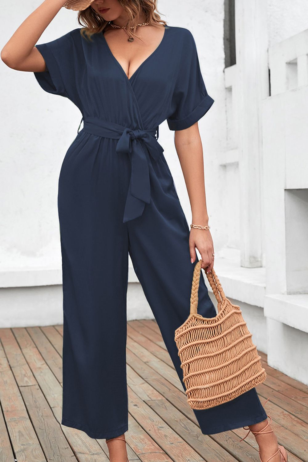 Tie Waist Surplice Wide Leg Jumpsuit - Premium from Momma Done Gone Crafty- Just $41.99! Shop now at Momma Done Gone Crafty
