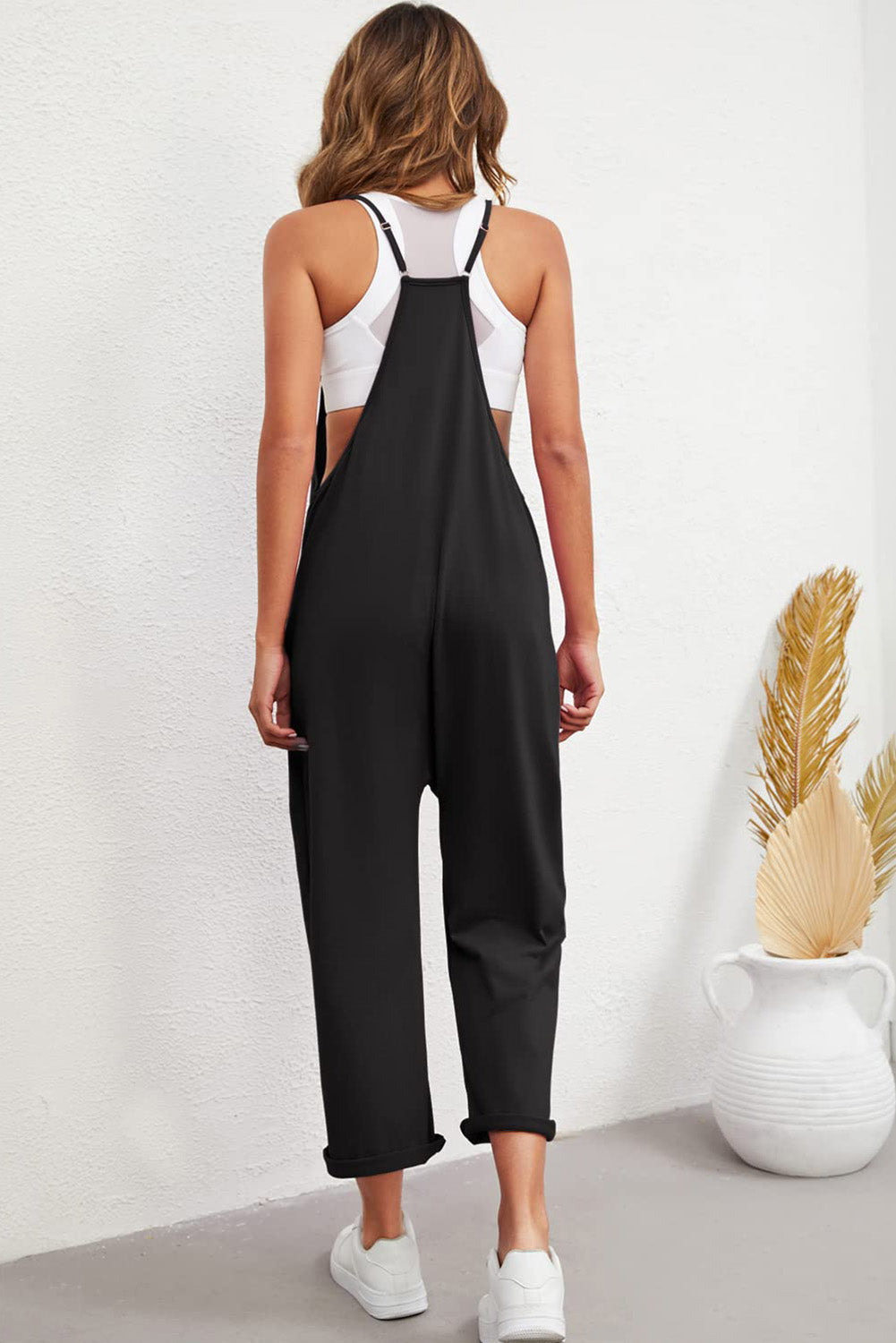 Black Pocketed Adjustable Spaghetti Strap Straight Leg Jumpsuit - Premium Bottoms from Momma Done Gone Crafty- Just $26.99! Shop now at Momma Done Gone Crafty
