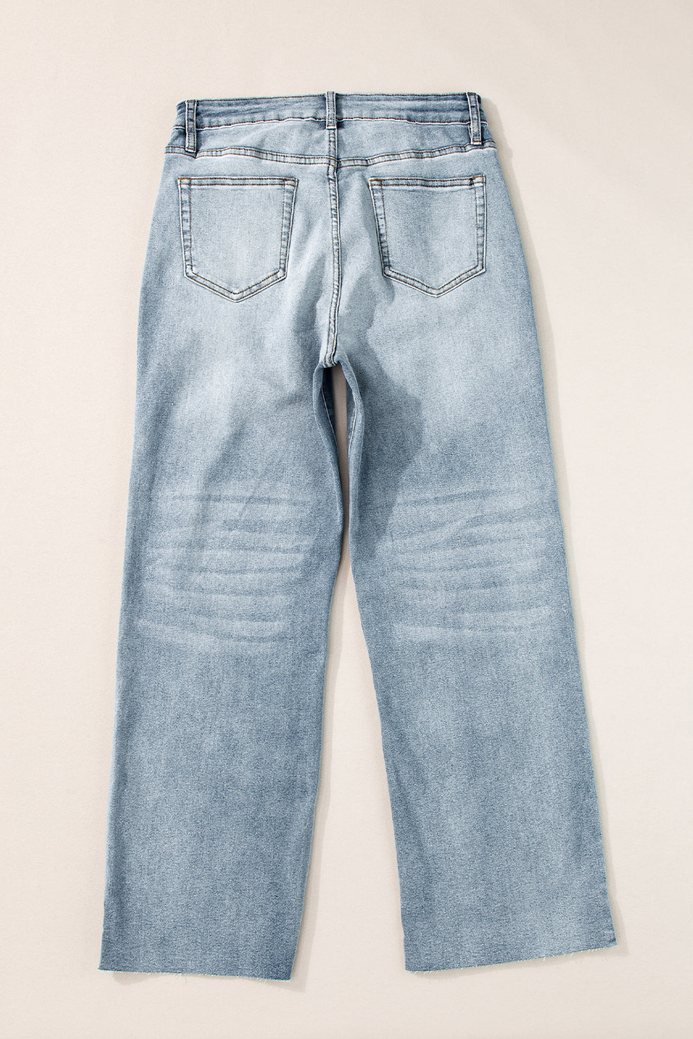 Light Blue Acid Wash Raw Edge Straight Jeans - Premium Bottoms/Jeans from Ashes 2 Wildflowers Boutique, LLC- Just $35.64! Shop now at Ashes 2 Wildflowers Boutique, LLC