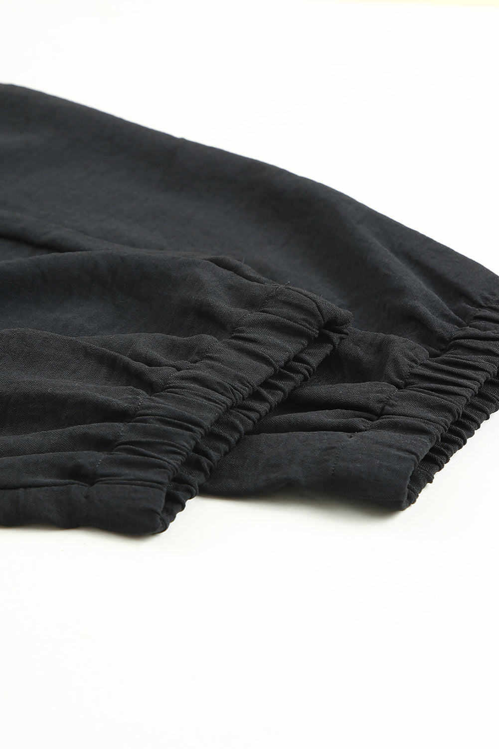 Black Solid Color Drawstring Smocked Waist Joggers - Premium Bottoms from Momma Done Gone Crafty- Just $47.40! Shop now at Momma Done Gone Crafty