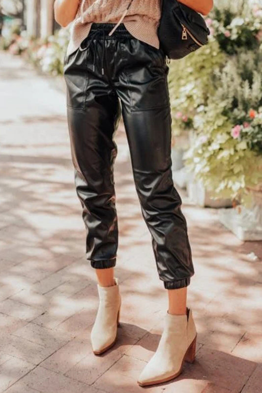 Black Faux Leather Ankle Smocked Waist Drawstring Joggers - Premium Bottoms/Pants & Culotte from Momma Done Gone Crafty- Just $25.65! Shop now at Momma Done Gone Crafty