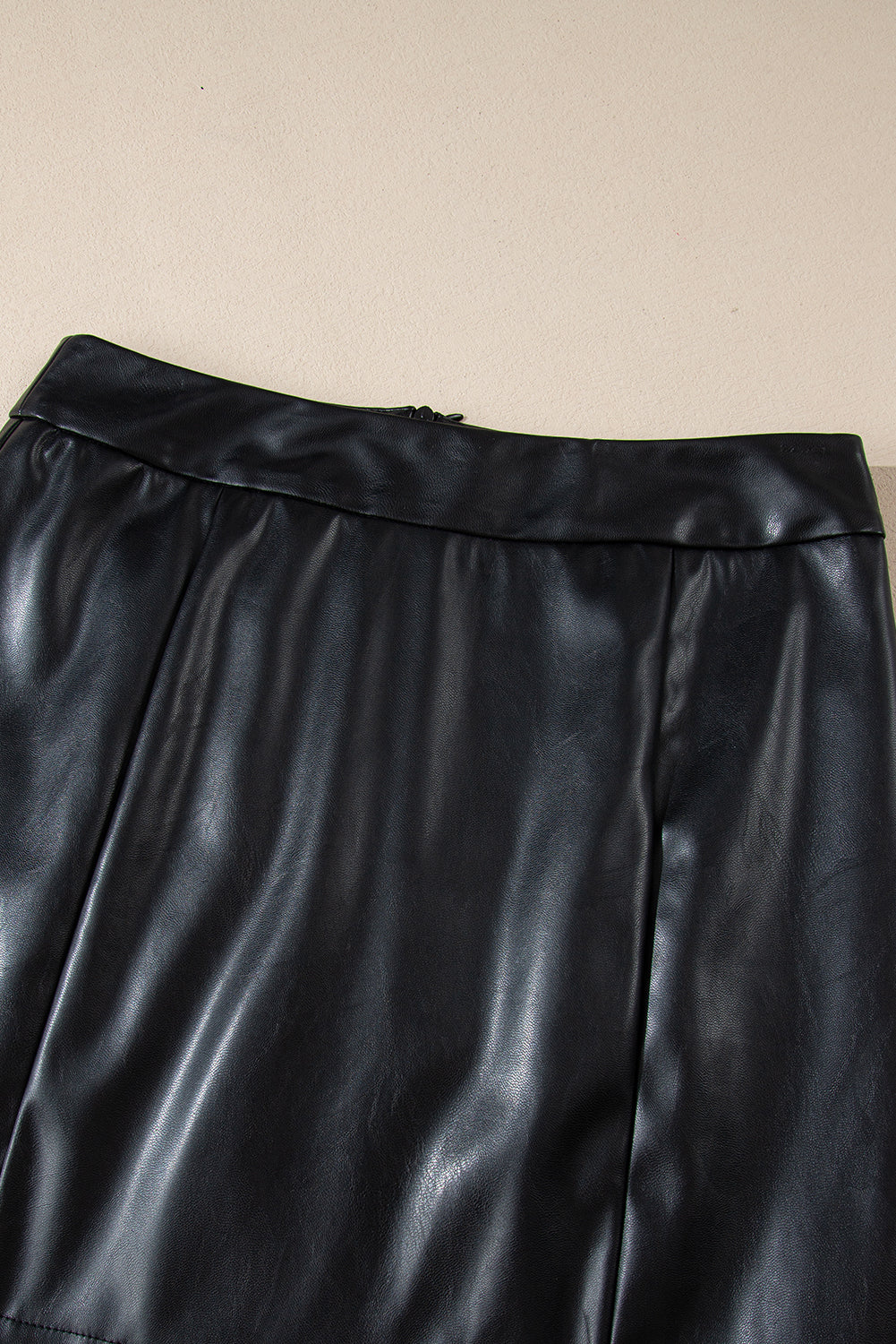 Black PU Leather Side Slits Slim Fit High Waist Mini Skirt - Premium Bottoms/Skirts & Petticoat from Momma Done Gone Crafty- Just $19.50! Shop now at Momma Done Gone Crafty