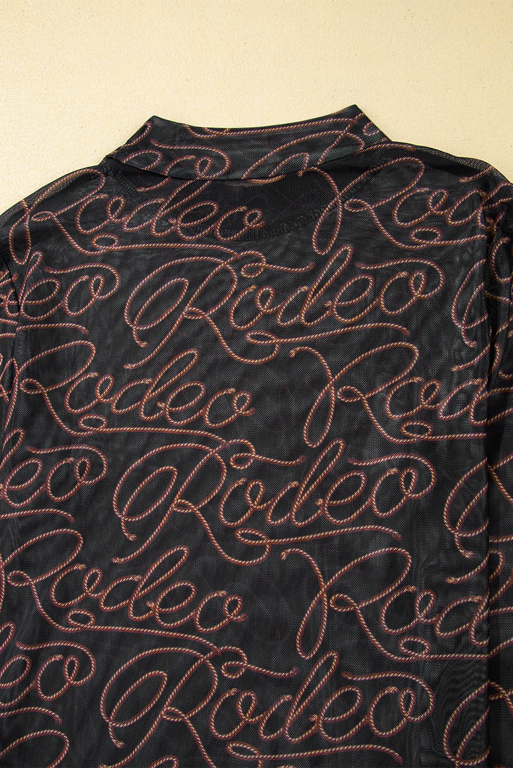 Black Western Rodeo Printed Mock Neck Long Sleeve Mesh Top - Premium Tops/Long Sleeve Tops from Ashes 2 Wildflowers Boutique, LLC- Just $24.65! Shop now at Ashes 2 Wildflowers Boutique, LLC
