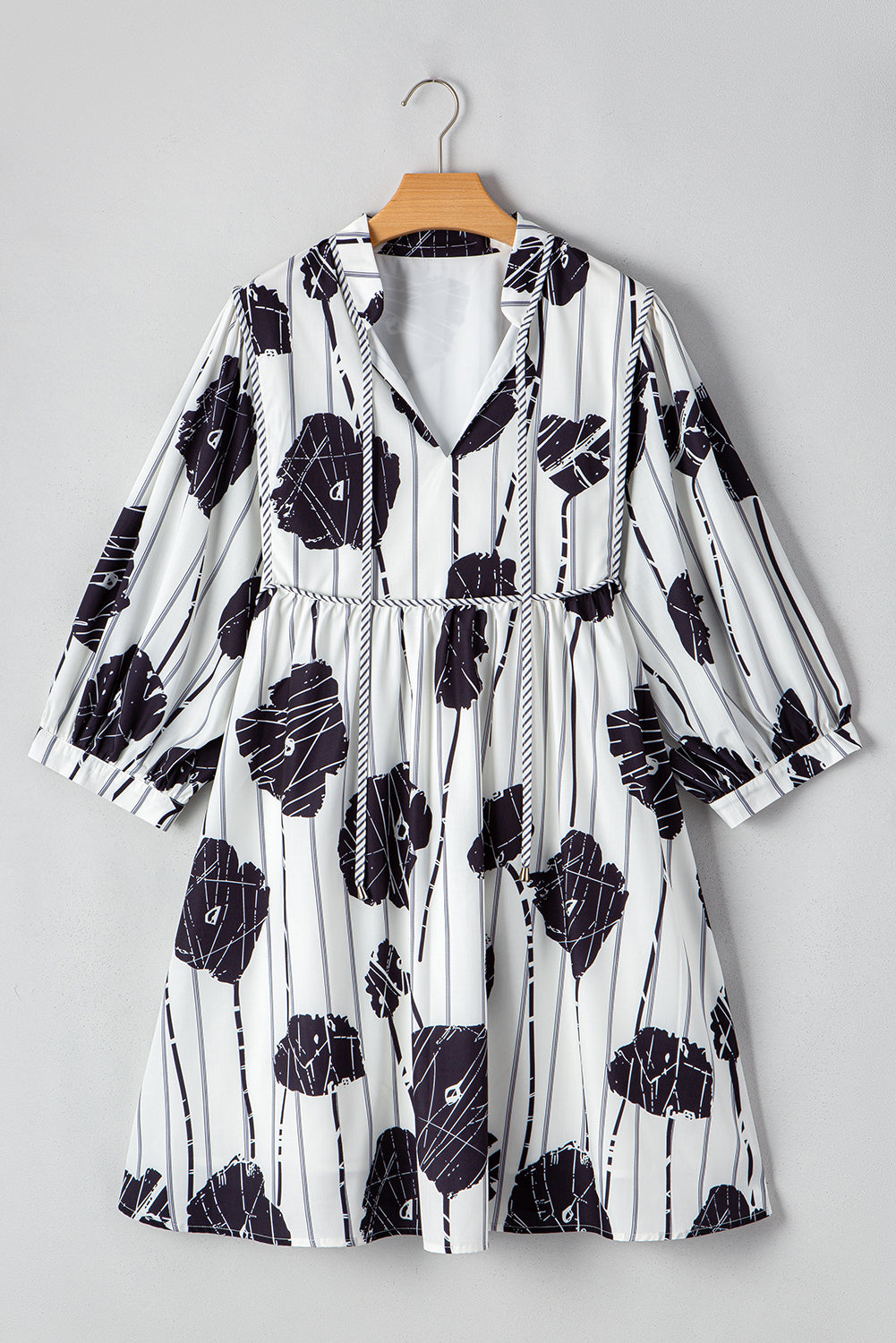 Black Plus Size Floral 3/4 Puff Sleeve Lace-up Neck Mini Dress - Premium Plus Size/Plus Size Dresses/Plus Size Mini Dresses from Momma Done Gone Crafty- Just $39.15! Shop now at Momma Done Gone Crafty