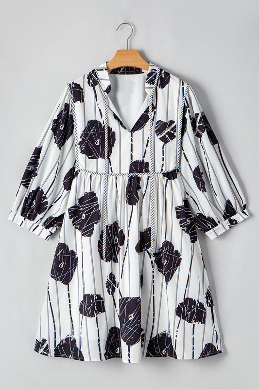 Black Plus Size Floral 3/4 Puff Sleeve Lace-up Neck Mini Dress - Premium Plus Size/Plus Size Dresses/Plus Size Mini Dresses from Momma Done Gone Crafty- Just $39.15! Shop now at Momma Done Gone Crafty