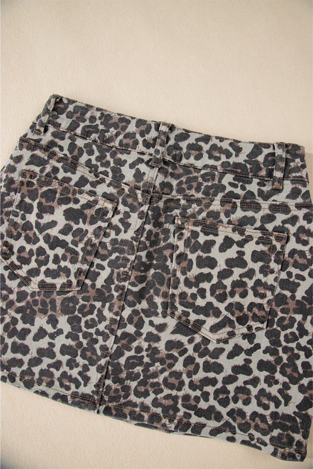 Khaki Leopard Denim Mini Skirt - Premium Bottoms/Skirts & Petticoat from Ashes 2 Wildflowers Boutique, LLC- Just $22.05! Shop now at Ashes 2 Wildflowers Boutique, LLC