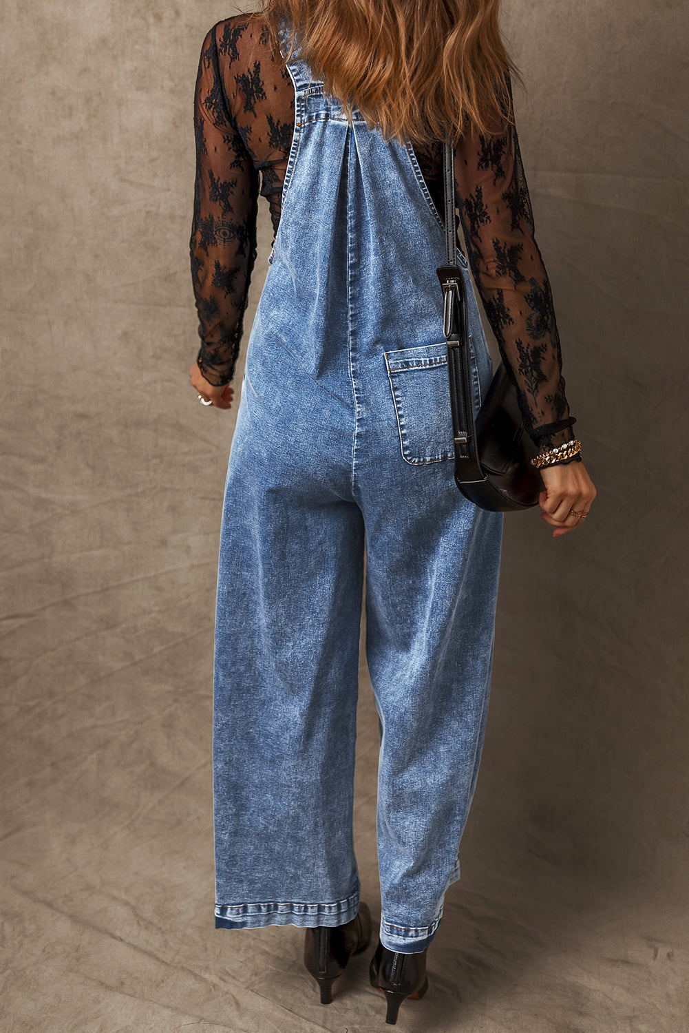 Light Blue Mineral Wash Buttoned Straps Wide Leg Denim Overalls - Premium Bottoms/Jumpsuits & Rompers from Ashes 2 Wildflowers Boutique, LLC- Just $47.10! Shop now at Ashes 2 Wildflowers Boutique, LLC