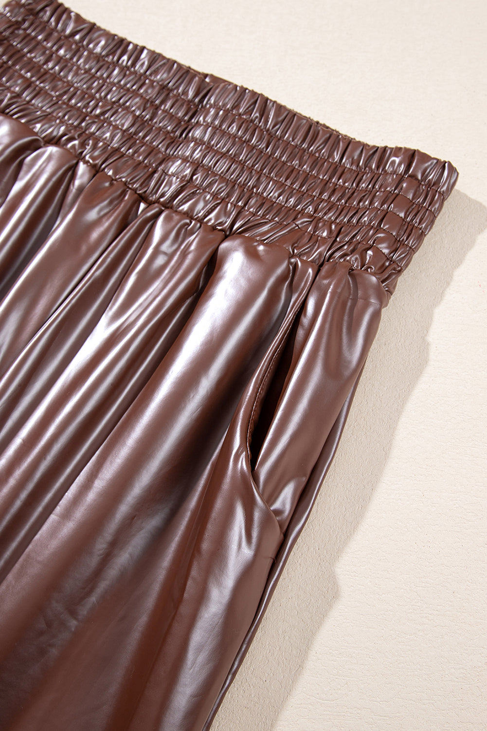 Brown Smocked High-Waist Leather Skinny Pants - Premium Bottoms from Momma Done Gone Crafty- Just $58.71! Shop now at Momma Done Gone Crafty