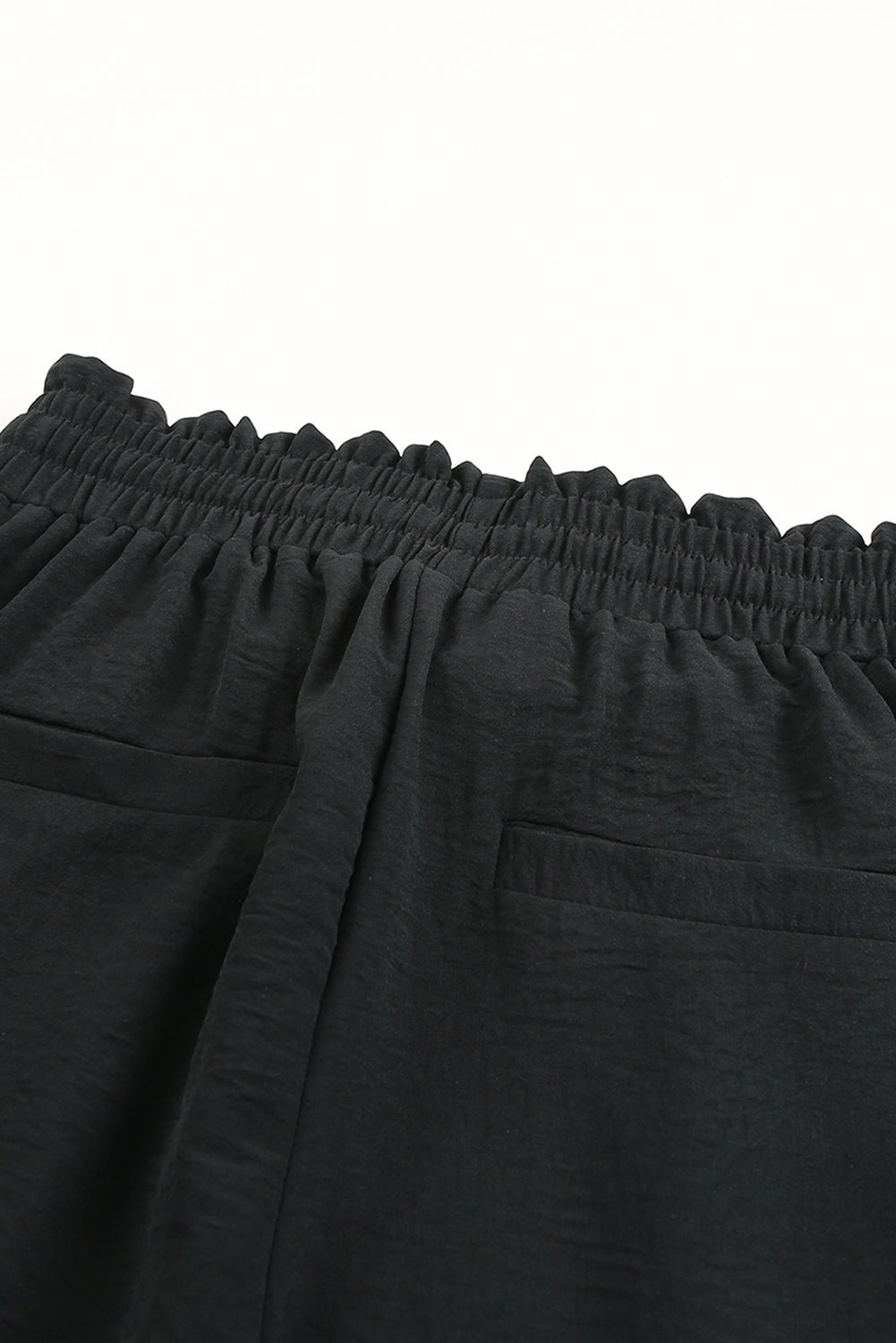 Black Solid Color Drawstring Smocked Waist Joggers - Premium Bottoms from Momma Done Gone Crafty- Just $47.40! Shop now at Momma Done Gone Crafty
