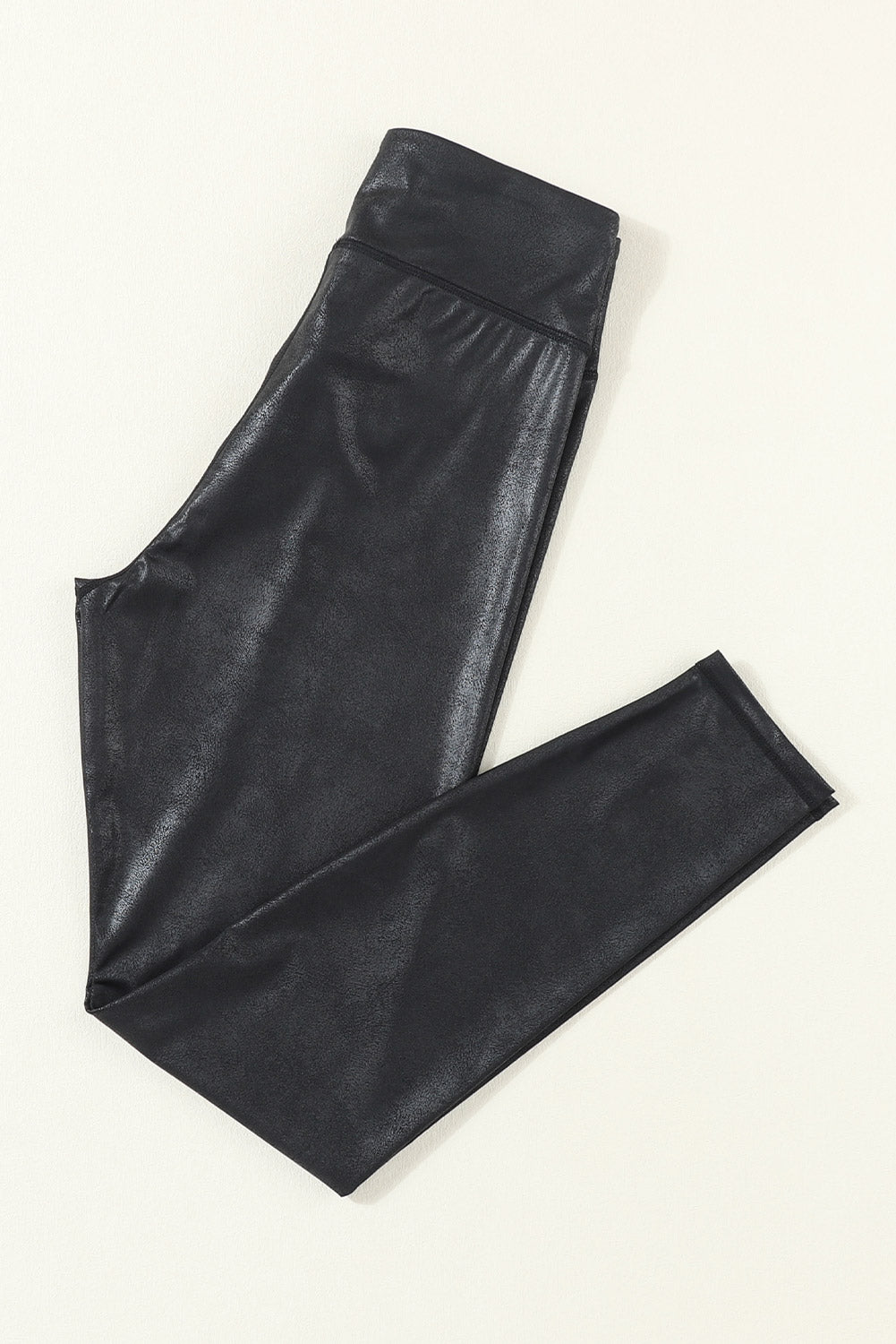 Black Crossed Dip Waist Sleek Leather Leggings - Premium Bottoms/Leggings from Momma Done Gone Crafty- Just $20.25! Shop now at Momma Done Gone Crafty