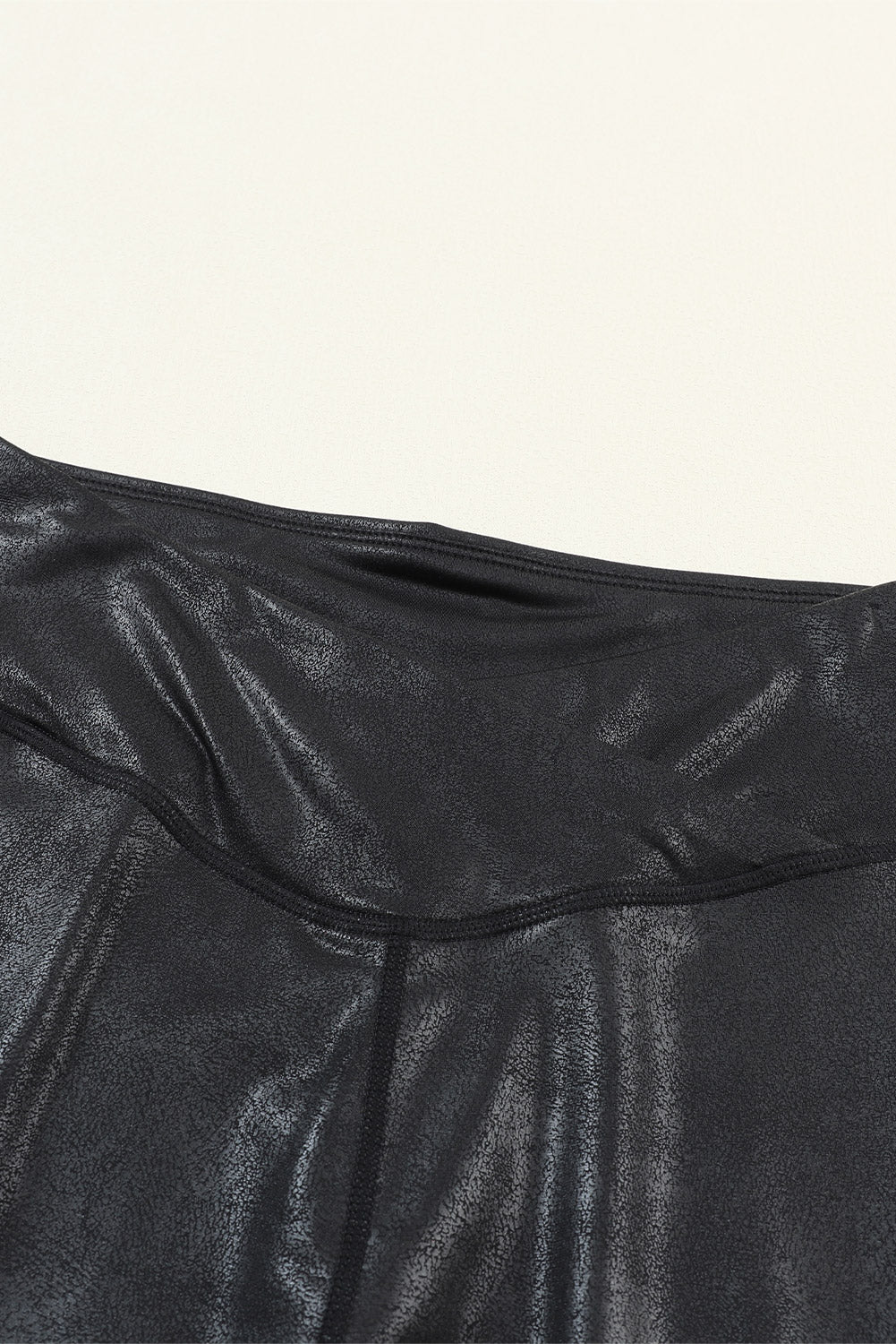 Black Crossed Dip Waist Sleek Leather Leggings - Premium Bottoms/Leggings from Momma Done Gone Crafty- Just $20.25! Shop now at Momma Done Gone Crafty