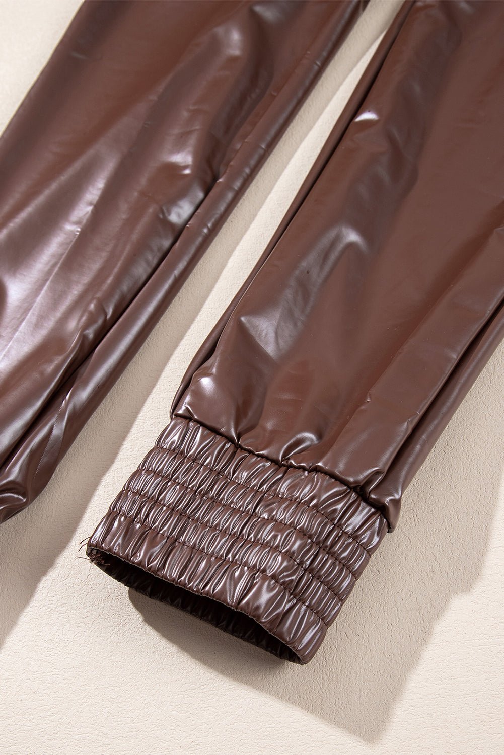 Brown Smocked High-Waist Leather Skinny Pants - Premium Bottoms from Momma Done Gone Crafty- Just $58.71! Shop now at Momma Done Gone Crafty