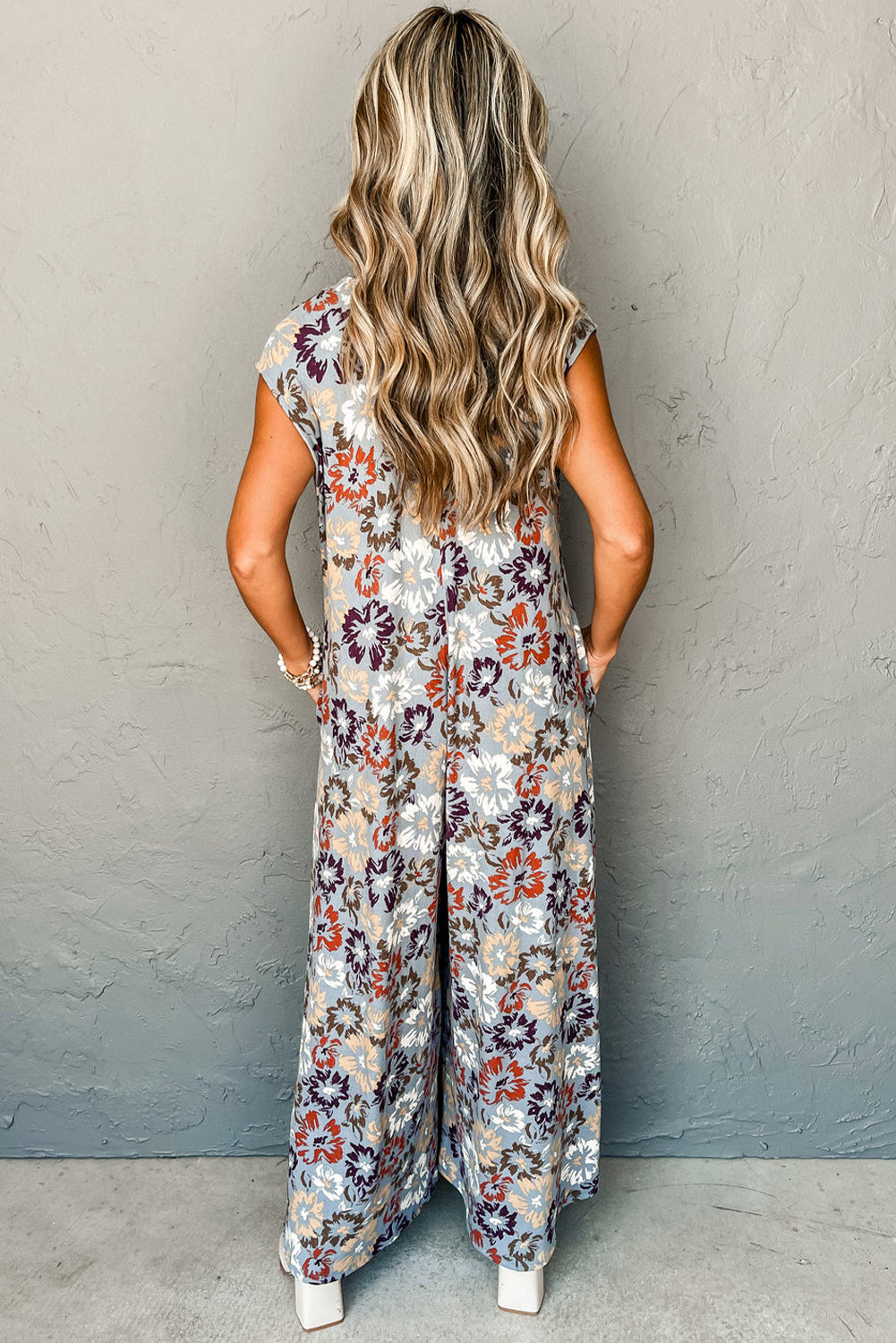 Sky Blue Floral Sleeveless Buttoned Pocketed Wide Leg Jumpsuit - Premium Bottoms/Jumpsuits & Rompers from Ashes 2 Wildflowers Boutique, LLC- Just $35.99! Shop now at Ashes 2 Wildflowers Boutique, LLC