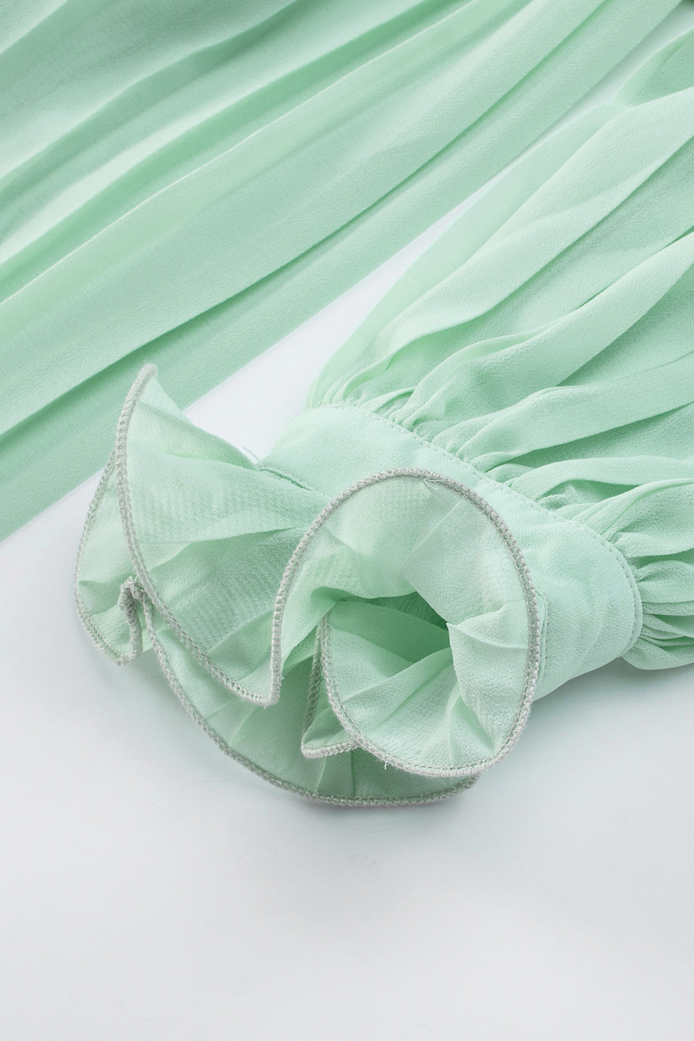 Green Pleated Ruffled Tie Waist Buttons V Neck Romper - Premium Bottoms from Momma Done Gone Crafty- Just $58.99! Shop now at Momma Done Gone Crafty