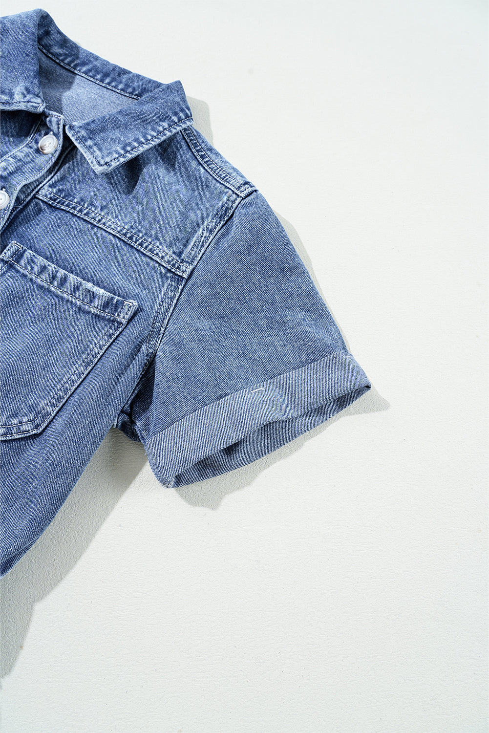 Dusk Blue Chest Pocket Front Buttoned Folded Edge Denim Short Sleeve Romper - Premium Bottoms/Jumpsuits & Rompers from Ashes 2 Wildflowers Boutique, LLC- Just $43.80! Shop now at Ashes 2 Wildflowers Boutique, LLC