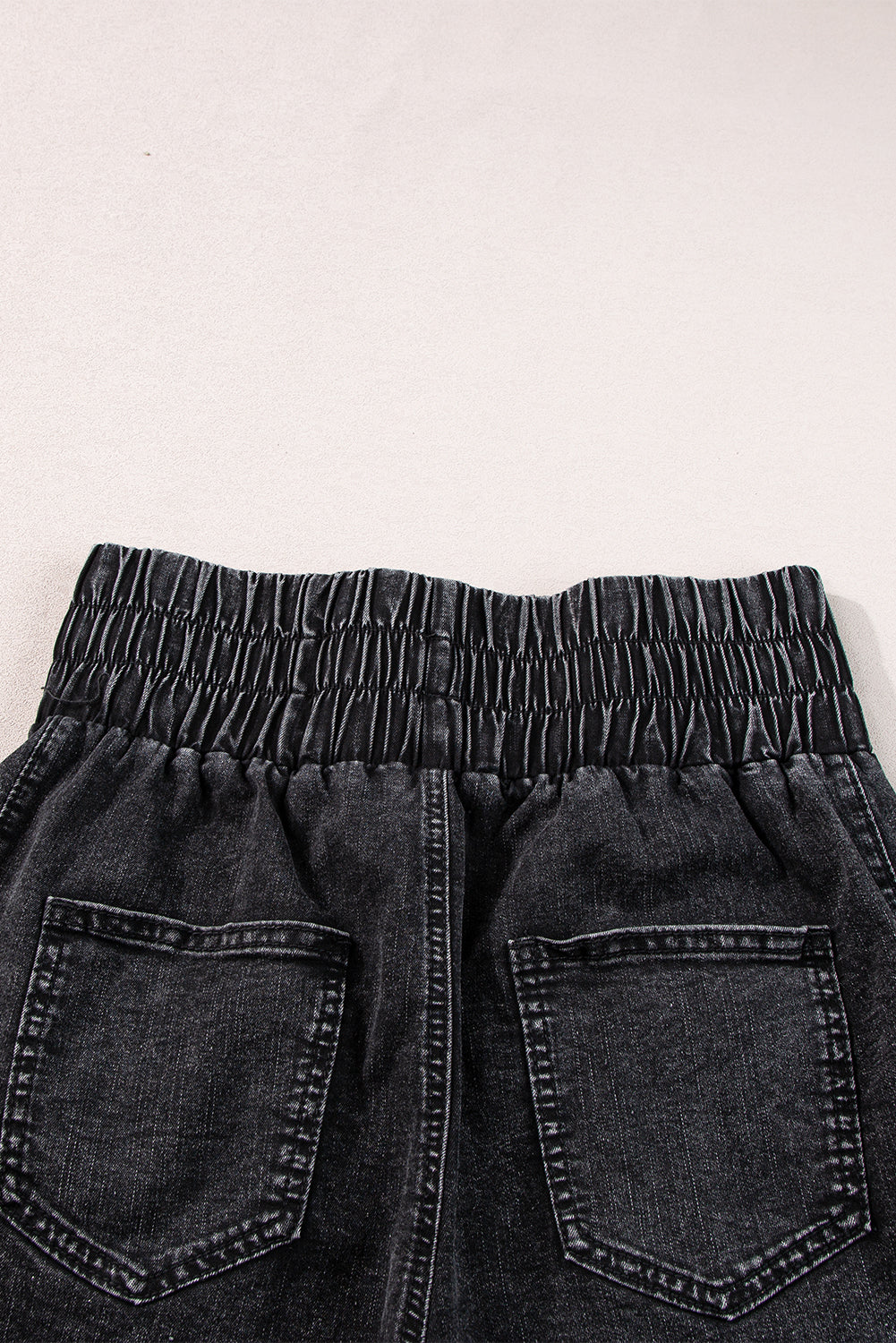 Black Smocked High Waist Mineral Washed Jean Shorts - Premium Bottoms/Denim Shorts from Ashes 2 Wildflowers Boutique, LLC- Just $27.60! Shop now at Ashes 2 Wildflowers Boutique, LLC