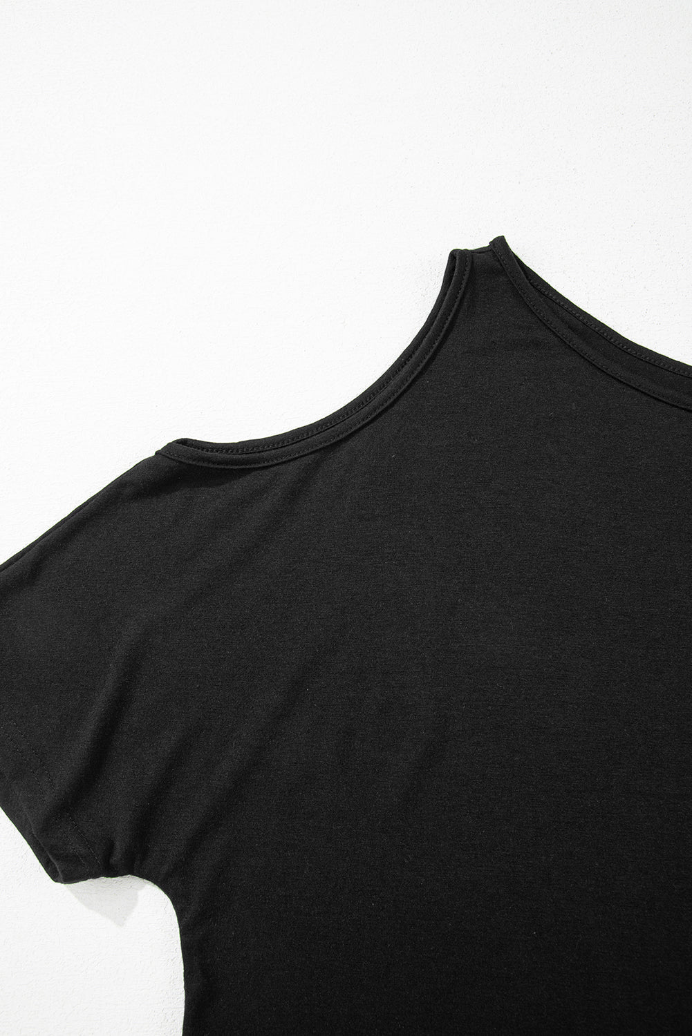 Black Solid Asymmetrical Neck Loose Casual T-Shirt - Premium Tops/Tops & Tees from Ashes 2 Wildflowers Boutique, LLC- Just $18.99! Shop now at Ashes 2 Wildflowers Boutique, LLC