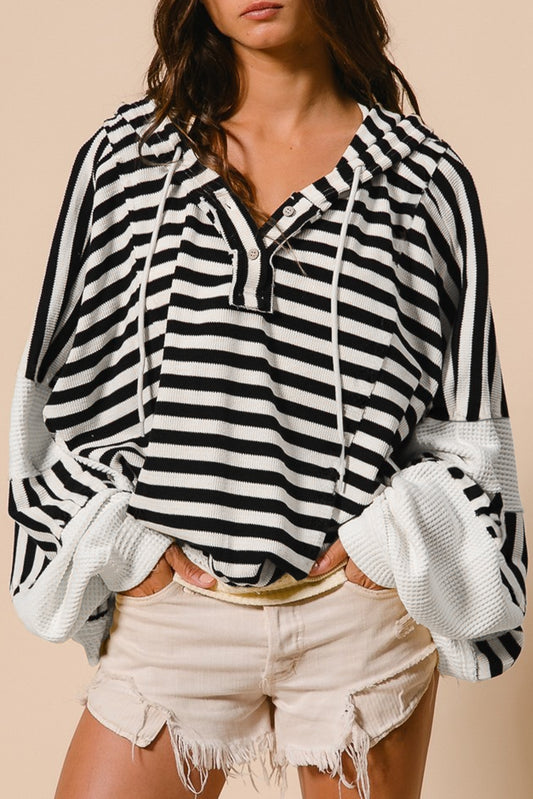 Black white Oversized Striped Henley Buttons Dolman Sleeve Hooded Top - Premium Tops/Long Sleeve Tops from Ashes 2 Wildflowers Boutique, LLC- Just $32.38! Shop now at Ashes 2 Wildflowers Boutique, LLC