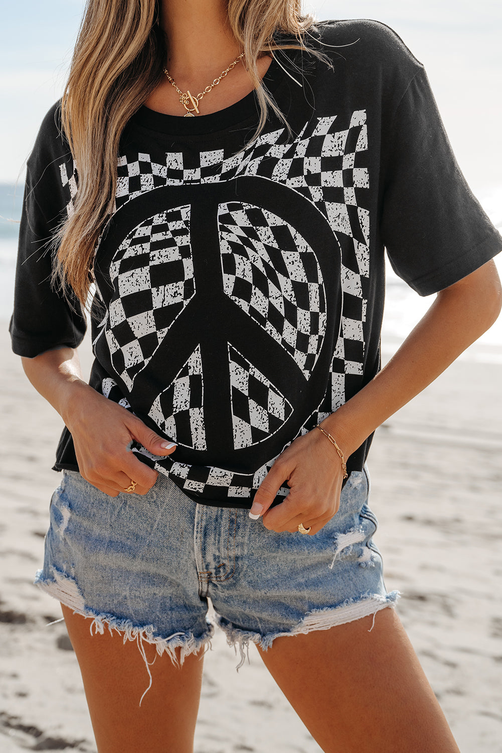 Black Checkerboard Peace Sign Printed Round Neck T Shirt - Premium Tops/Tops & Tees from Ashes 2 Wildflowers Boutique, LLC- Just $26! Shop now at Ashes 2 Wildflowers Boutique, LLC