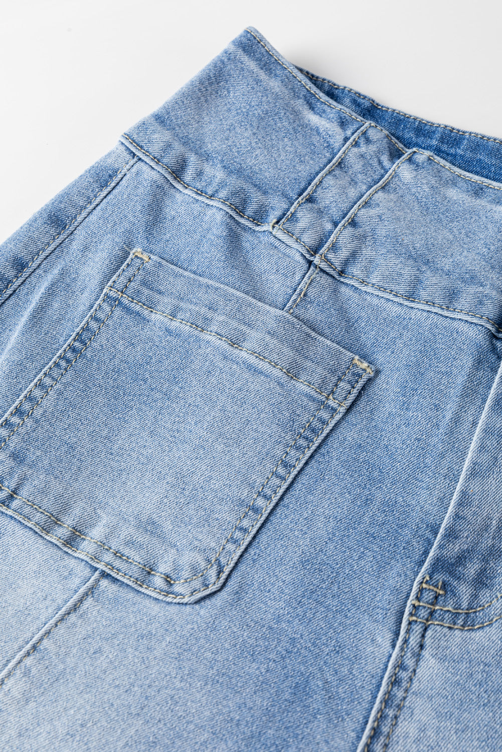 Light Blue Fly Button Exposed Seam Patched Pocket Flare Jeans - Premium Bottoms/Jeans from Ashes 2 Wildflowers Boutique, LLC- Just $36.63! Shop now at Ashes 2 Wildflowers Boutique, LLC