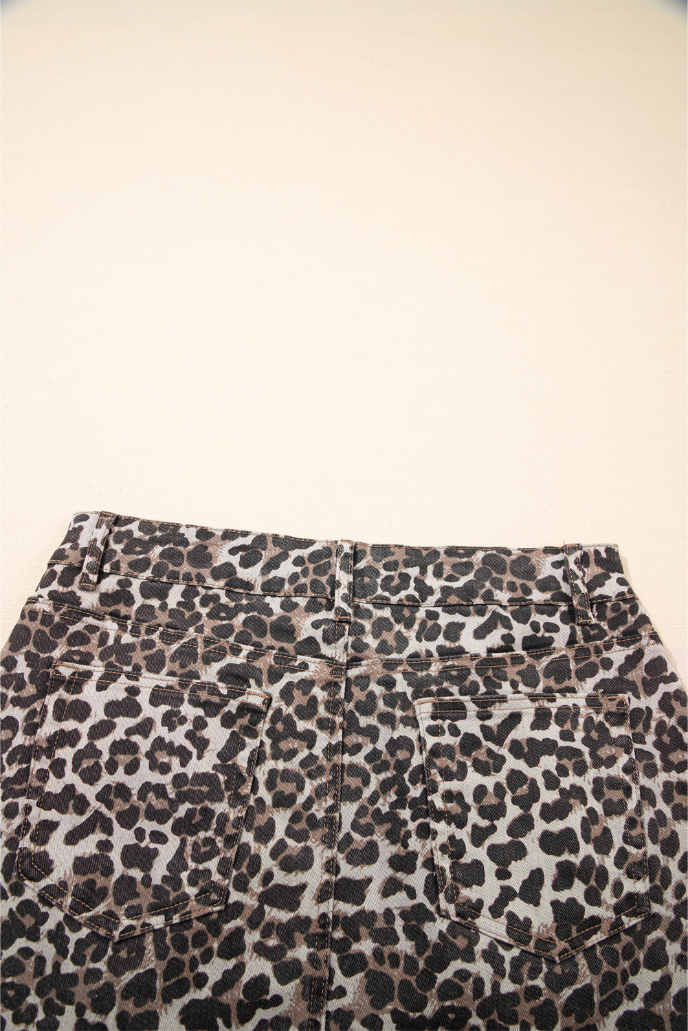 Khaki Leopard Denim Mini Skirt - Premium Bottoms/Skirts & Petticoat from Ashes 2 Wildflowers Boutique, LLC- Just $22.05! Shop now at Ashes 2 Wildflowers Boutique, LLC
