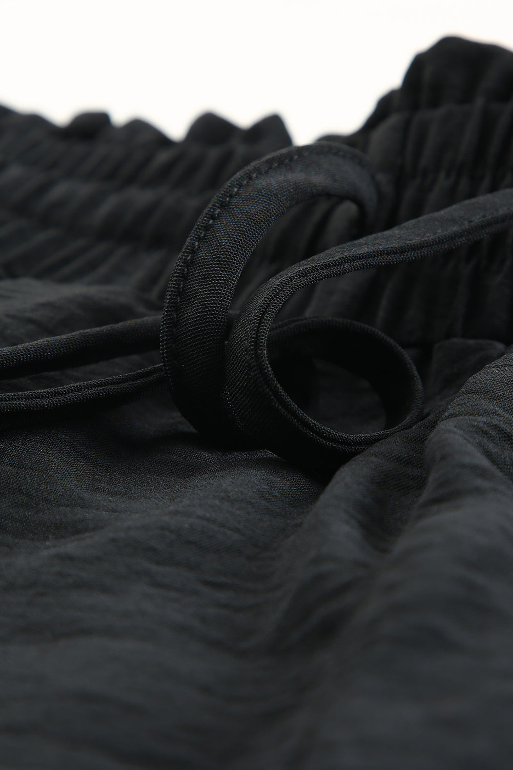Black Solid Color Drawstring Smocked Waist Joggers - Premium Bottoms from Momma Done Gone Crafty- Just $47.40! Shop now at Momma Done Gone Crafty