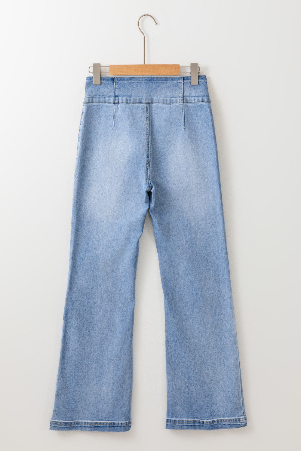 Light Blue Fly Button Exposed Seam Patched Pocket Flare Jeans - Premium Bottoms/Jeans from Ashes 2 Wildflowers Boutique, LLC- Just $36.63! Shop now at Ashes 2 Wildflowers Boutique, LLC