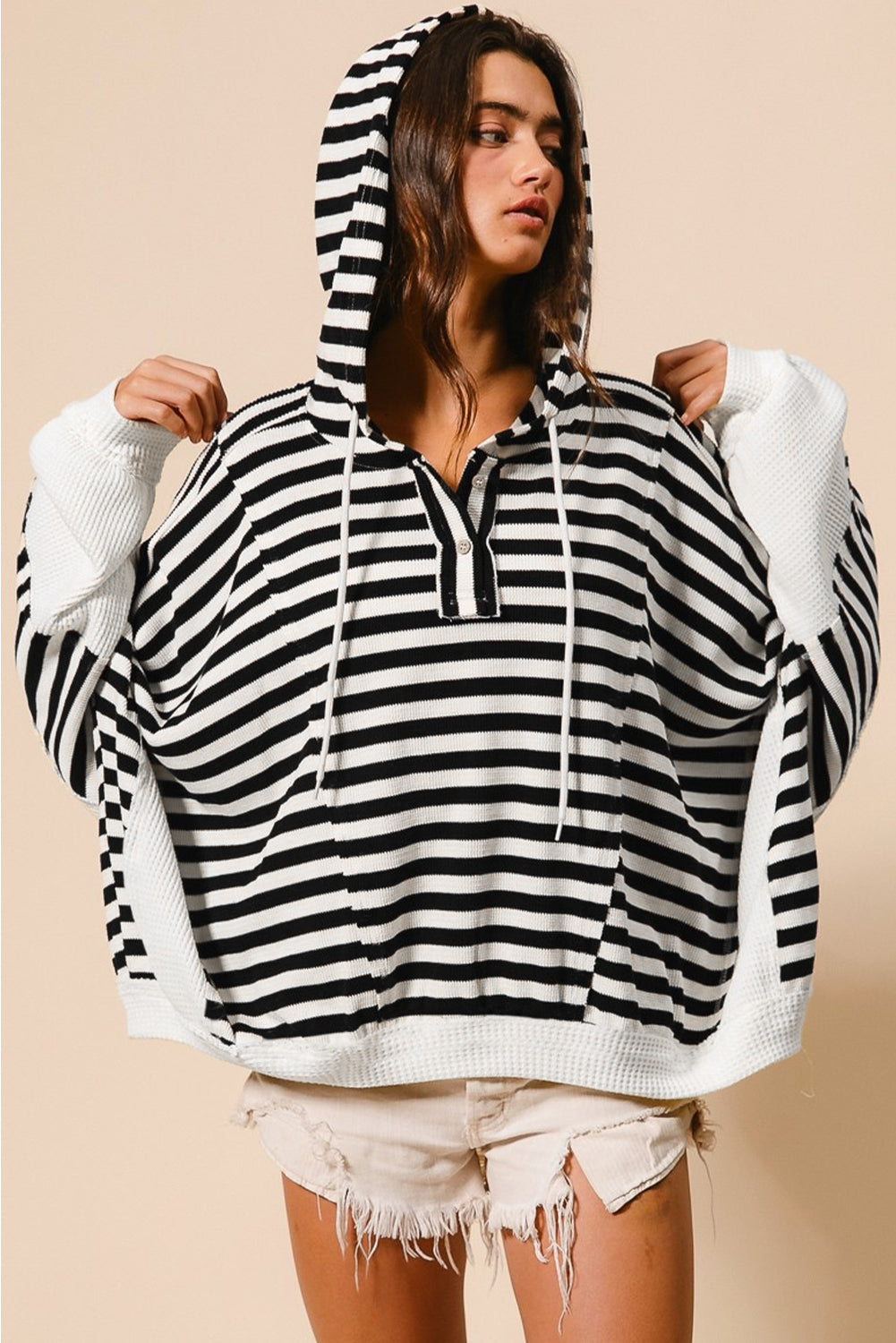 Black white Oversized Striped Henley Buttons Dolman Sleeve Hooded Top - Premium Tops/Long Sleeve Tops from Ashes 2 Wildflowers Boutique, LLC- Just $32.38! Shop now at Ashes 2 Wildflowers Boutique, LLC