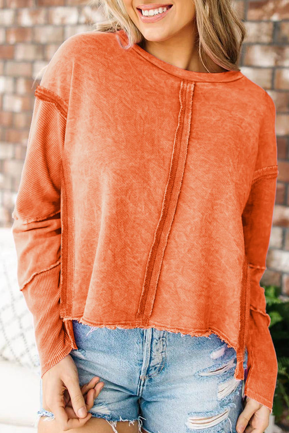 Orange Exposed Seamed High Low Raw Edge Sweatshirt - Premium Tops from Momma Done Gone Crafty- Just $40.80! Shop now at Momma Done Gone Crafty