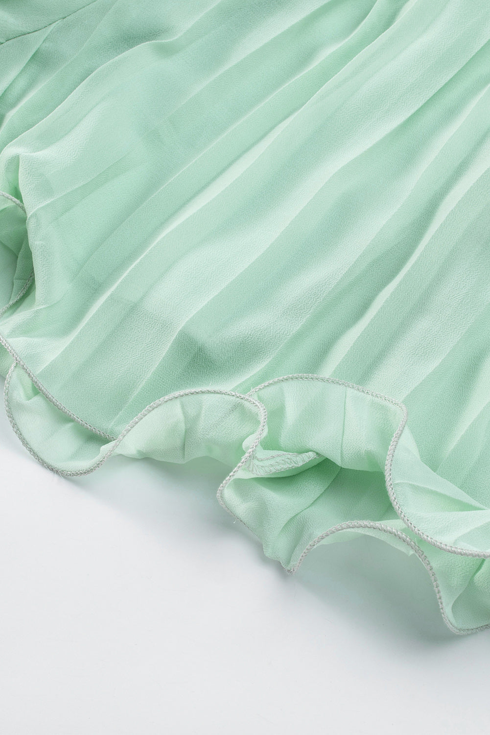 Green Pleated Ruffled Tie Waist Buttons V Neck Romper - Premium Bottoms from Momma Done Gone Crafty- Just $58.99! Shop now at Momma Done Gone Crafty