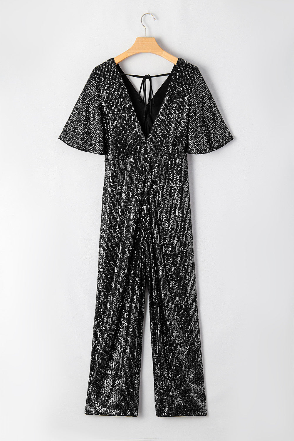 Black Sequin V Neck Flutter Sleeve Wide Leg Jumpsuit - Premium Bottoms/Jumpsuits & Rompers from Ashes 2 Wildflowers Boutique, LLC- Just $53.10! Shop now at Ashes 2 Wildflowers Boutique, LLC