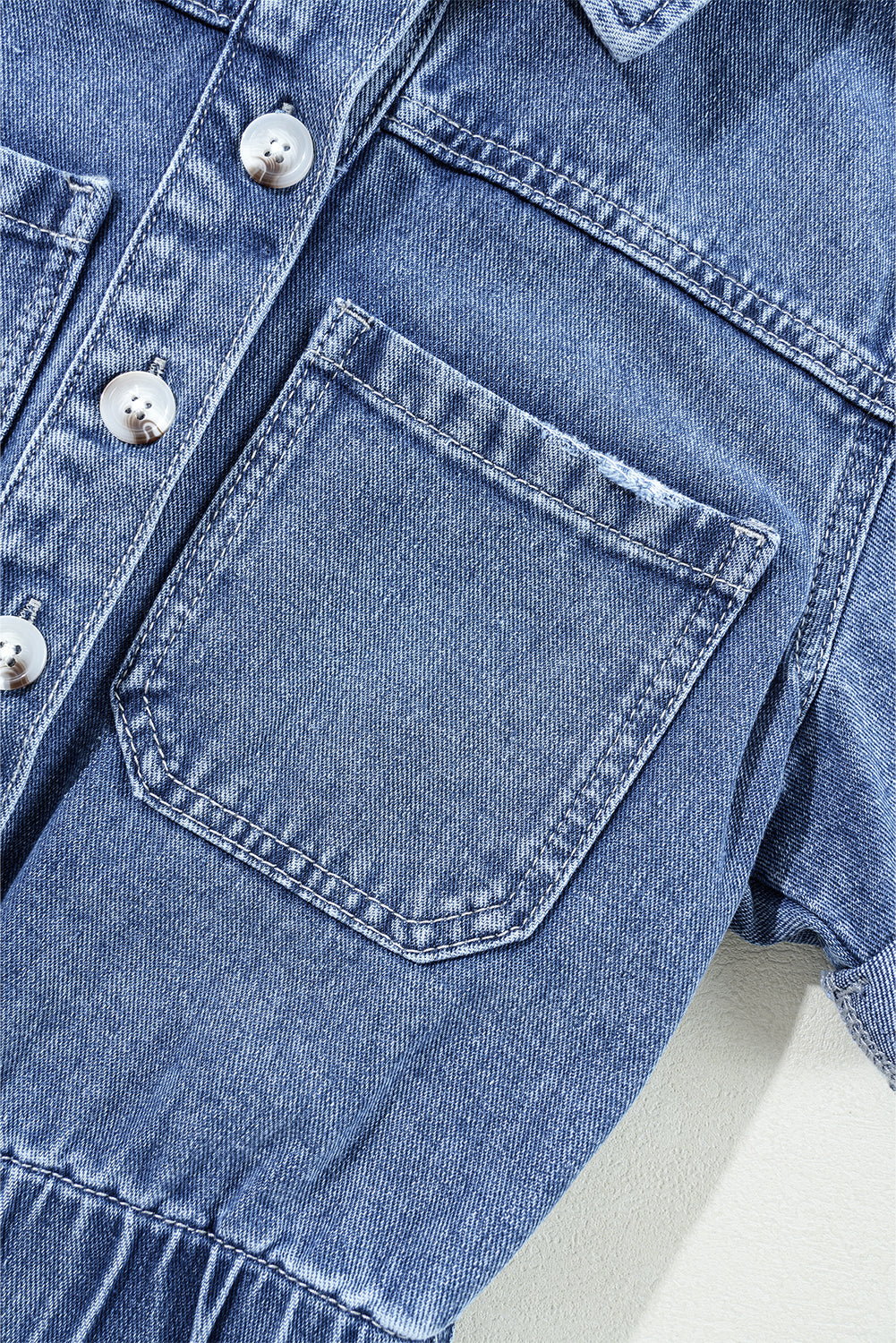 Dusk Blue Chest Pocket Front Buttoned Folded Edge Denim Short Sleeve Romper - Premium Bottoms/Jumpsuits & Rompers from Ashes 2 Wildflowers Boutique, LLC- Just $43.80! Shop now at Ashes 2 Wildflowers Boutique, LLC
