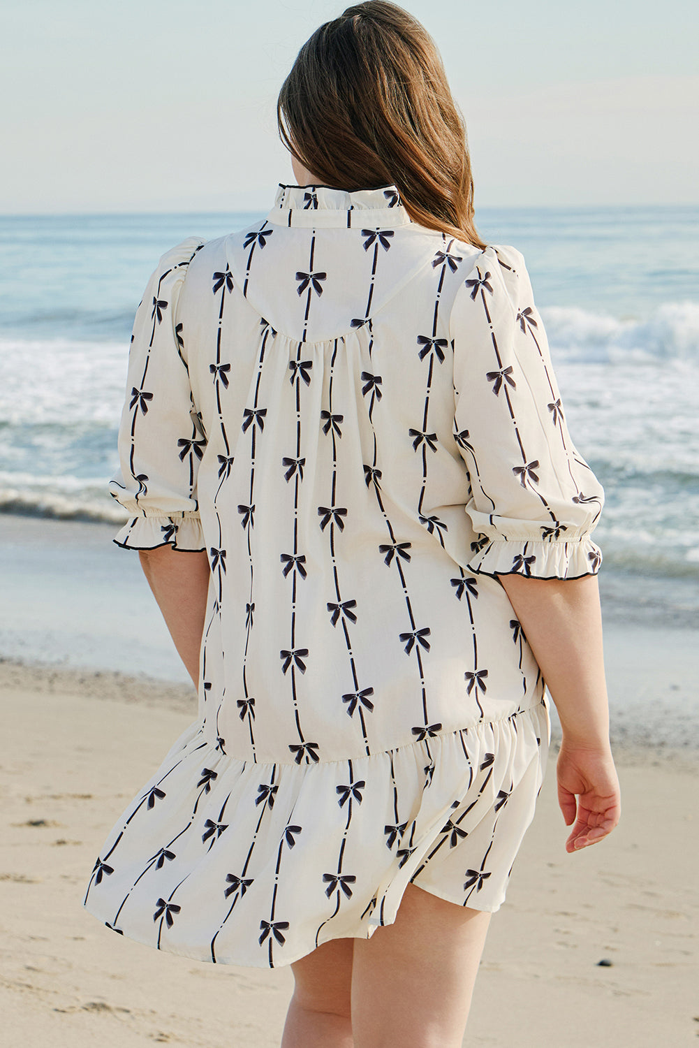 Apricot Bow Printed Puff Sleeve Ruffled Plus Size Mini Dress - Premium Plus Size/Plus Size Dresses/Plus Size Mini Dresses from Momma Done Gone Crafty- Just $36.90! Shop now at Momma Done Gone Crafty