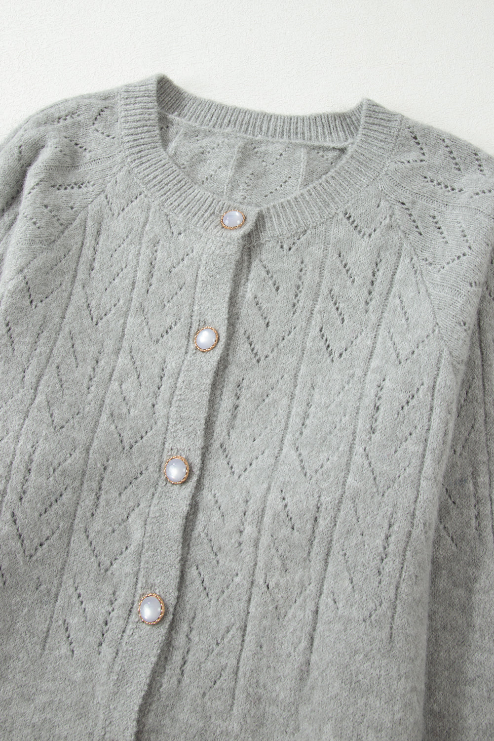 Hollow Out Buttoned Knit Cardigan - Premium Tops from Momma Done Gone Crafty- Just $59.10! Shop now at Momma Done Gone Crafty