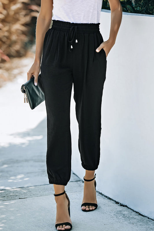 Black Solid Color Drawstring Smocked Waist Joggers - Premium Bottoms from Momma Done Gone Crafty- Just $47.40! Shop now at Momma Done Gone Crafty
