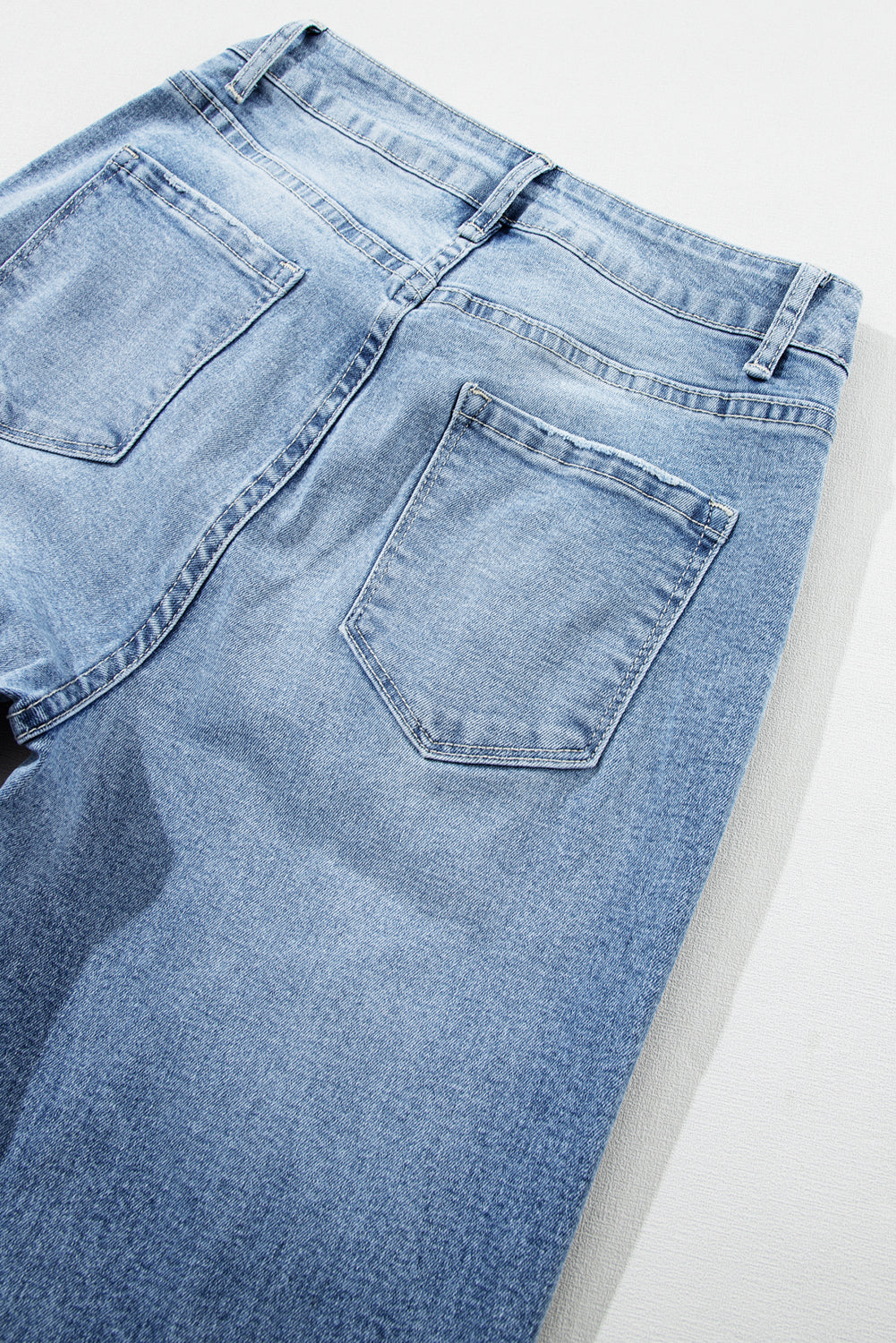 Light Blue High Rise Distressed Straight Leg Jeans - Premium Bottoms/Jeans from Ashes 2 Wildflowers Boutique, LLC- Just $37.14! Shop now at Ashes 2 Wildflowers Boutique, LLC